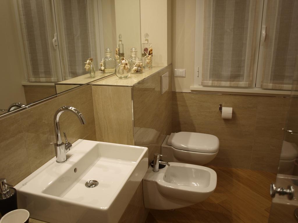 Il Pontile Holidays Apartment มารินา ดิ เปียตราซันตา ห้อง รูปภาพ