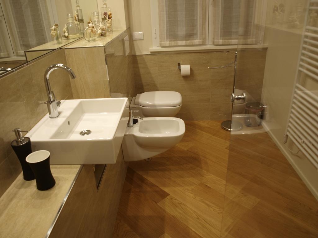 Il Pontile Holidays Apartment มารินา ดิ เปียตราซันตา ห้อง รูปภาพ