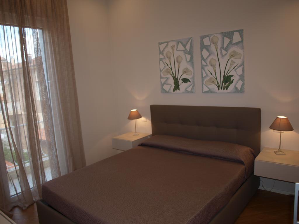 Il Pontile Holidays Apartment มารินา ดิ เปียตราซันตา ห้อง รูปภาพ